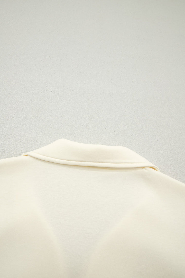 Juniper Ruffled Short Sleeve Blouse