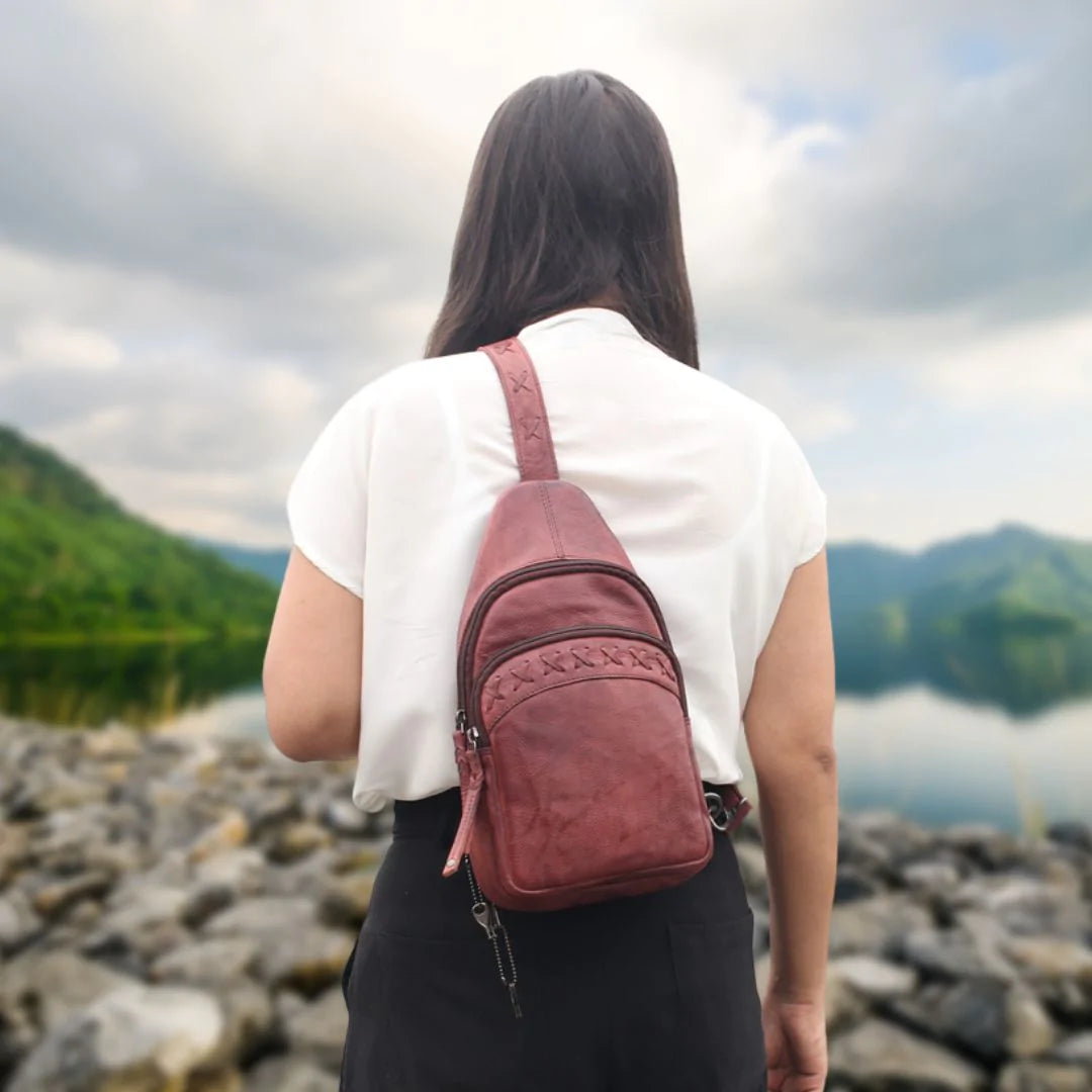 TAYLOR SLING LEATHER BACKPACK